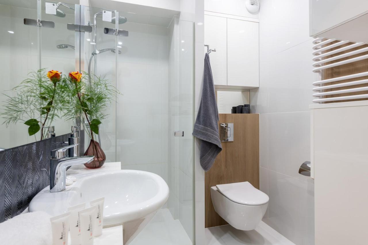 Plac Bankowy Serviced Apartments วอร์ซอ ภายนอก รูปภาพ